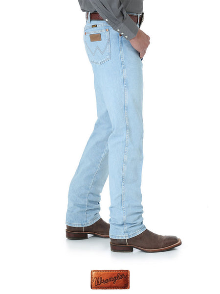 Wrangler 0936GBH Mens Cowboy Cut Slim Fit Jeans Bleach side view. If you need any assistance with this item or the purchase of this item please call us at five six one seven four eight eight eight zero one Monday through Saturday 10:00a.m EST to 8:00 p.m EST