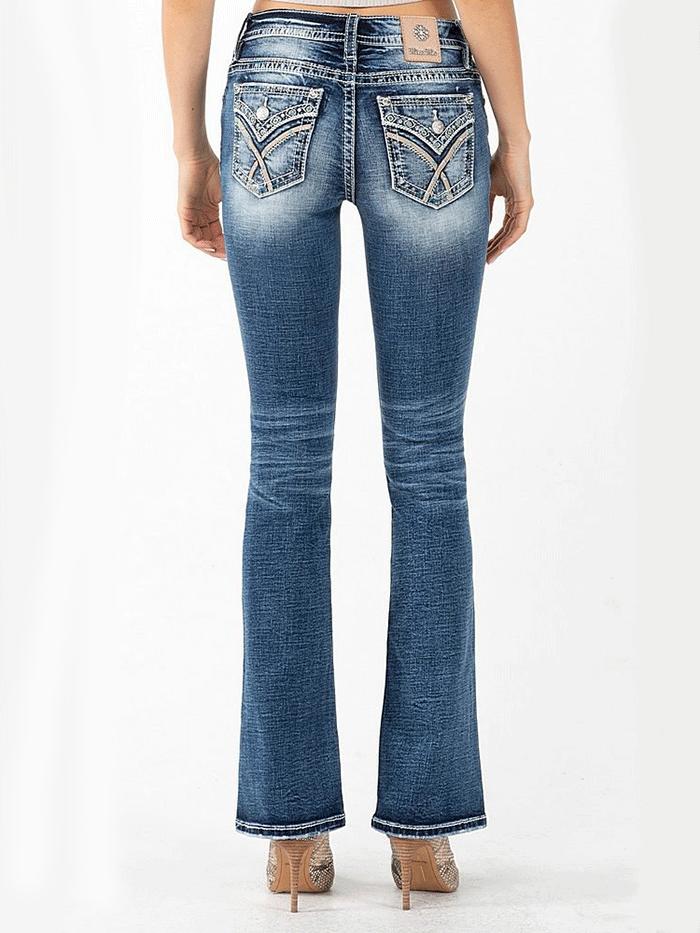 Miss Me M3444B55 Womens Aztec Bootcut Jeans Dark Blue back pocket close up. If you need any assistance with this item or the purchase of this item please call us at five six one seven four eight eight eight zero one Monday through Saturday 10:00a.m EST to 8:00 p.m EST