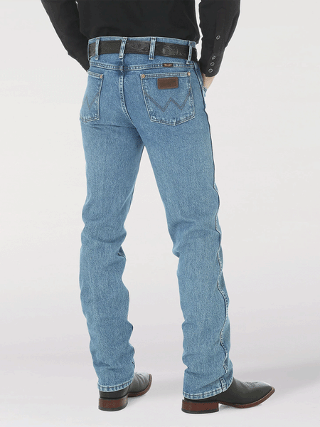 Wrangler 1036MWZSW Mens Premium Performance Cowboy Cut Slim Fit Jean Stonewash back view. If you need any assistance with this item or the purchase of this item please call us at five six one seven four eight eight eight zero one Monday through Saturday 10:00a.m EST to 8:00 p.m EST