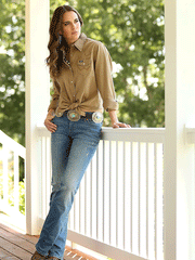 Wrangler 10LW1031T Womens Long Sleeve Western Snap Shirt Rawhide fron view on model outdoors. If you need any assistance with this item or the purchase of this item please call us at five six one seven four eight eight eight zero one Monday through Saturday 10:00a.m EST to 8:00 p.m EST